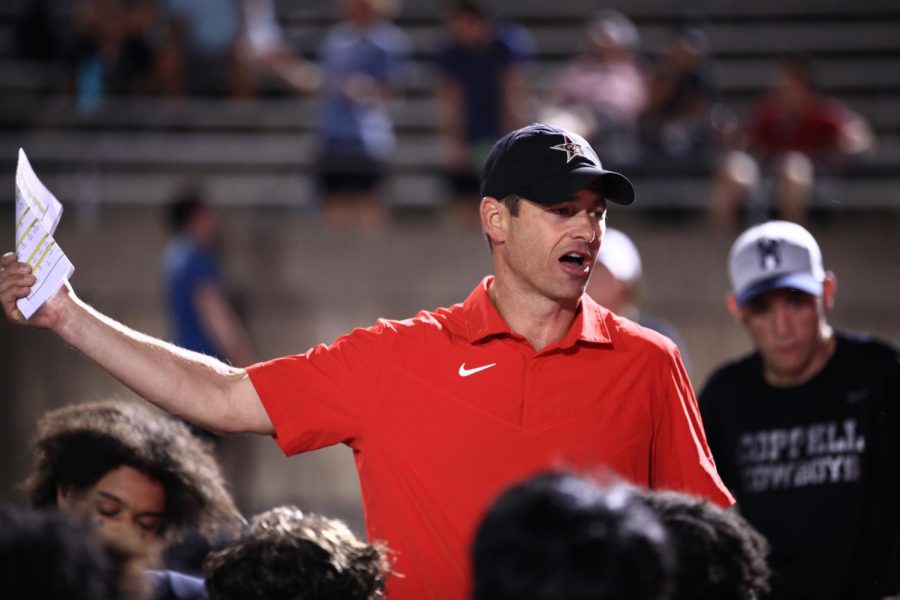 Coppell coach Mike DeWitt addresses his team after a 28-13 loss to Highland Park on Sept. 10 at Buddy Echols Field. DeWitt announced Monday that he’ll resign from his position as boys athletic coordinator and head football coach at the end of the school year.