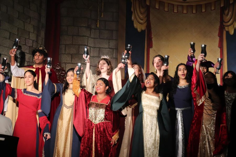 Coppell High School Madrigal choir raises a toast to its guests by performing “Wassail Song” by Stephen Paulus on Friday. CHS Choir held its 27th annual Madrigal Feast on Friday and Saturday. 