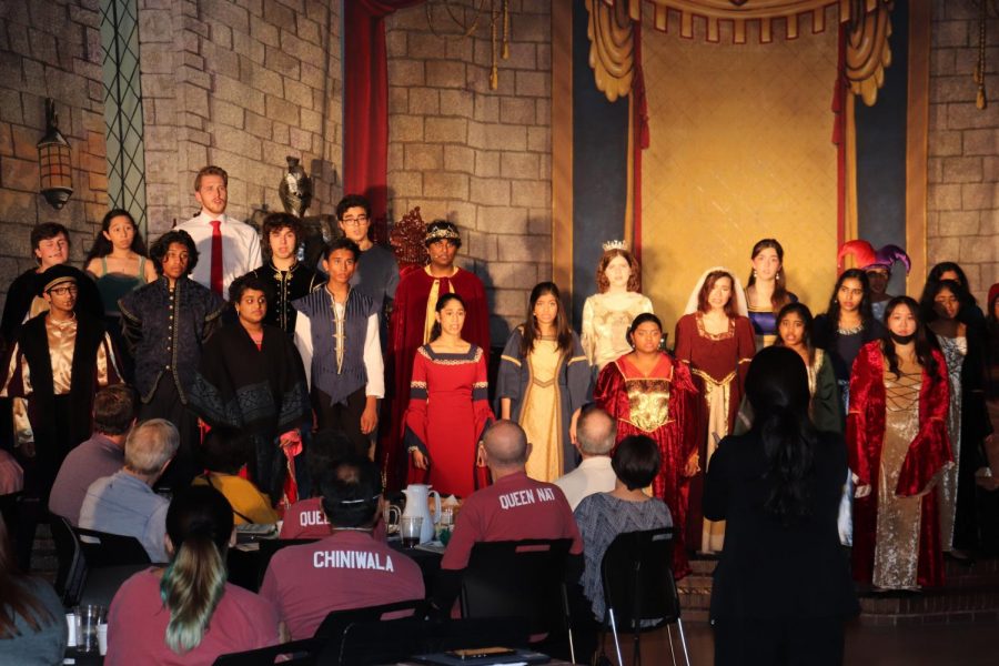 Coppell High School Madrigal alumni join the Madrigal choir in performing “Silent Night” by Gruber on Friday. CHS Choir held its 27th annual Madrigal Feast on Friday and Saturday. 