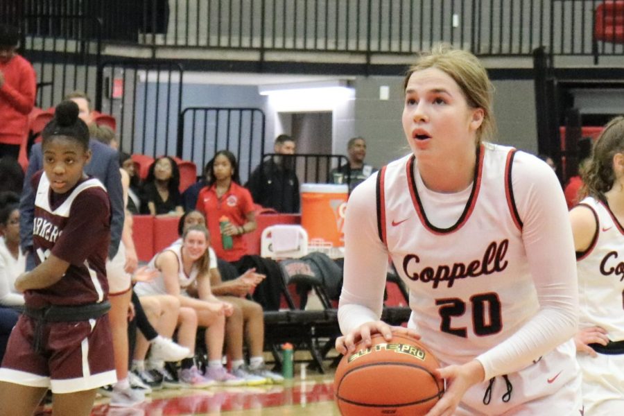 Coppell junior guard Jules Lamendola shoots a free throw against Lewisville at the CHS Arena on Friday. The Cowgirls defeated the Farmers, 66-32.