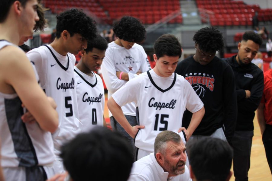 Coppell coach Clint Schnell talks to the Cowboys in the final timeout against Flower Mound at CHS Arena on Jan. 14. The Cowboys are in the midst of a rebuilding year, giving younger, less experienced athletes the opportunity to further develop.
