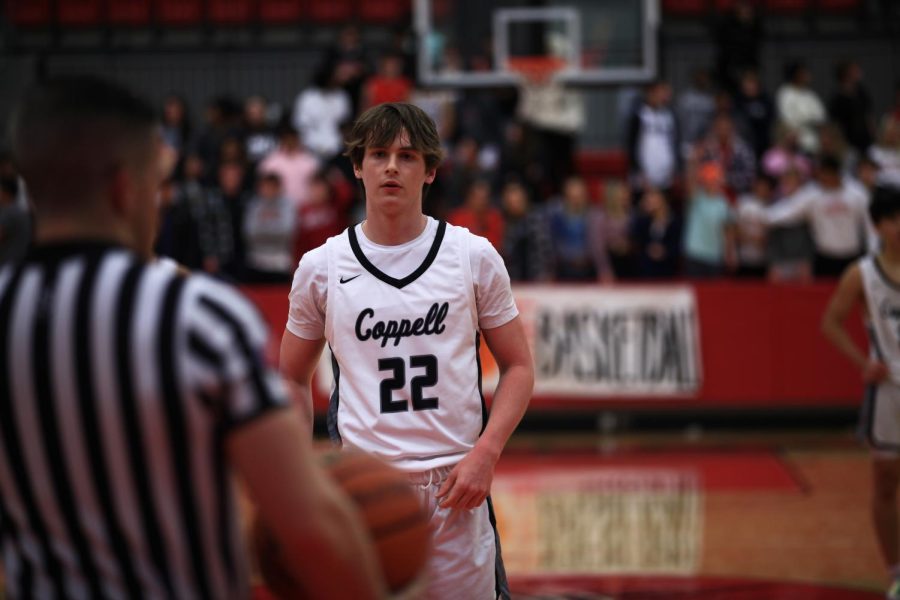 Coppell senior guard Parker Clark shoots a free throw at CHS Arena on Friday. The Cowboys beat Plano West, 54-24. Photo by Olivia Short.
