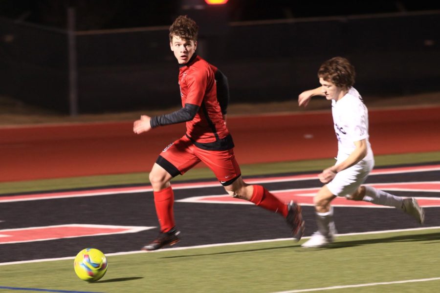 Coppell senior defender Colin Bezack clears against Plano on Tuesday at Buddy Echols Field. The Cowboys play Flower Mound Marcus tonight at Buddy Echols Field, with kickoff at 7:30 p.m.