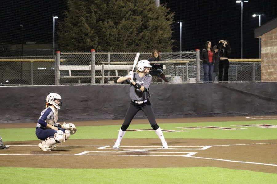 Coppell senior varsity pitcher Katherine Miller bats against Frisco Wakeland in the Coppell ISD Baseball/Softball Complex. The Cowgirls defeated Wakeland on Tuesday, 8-4. Photo by Sruthi Lingam 
