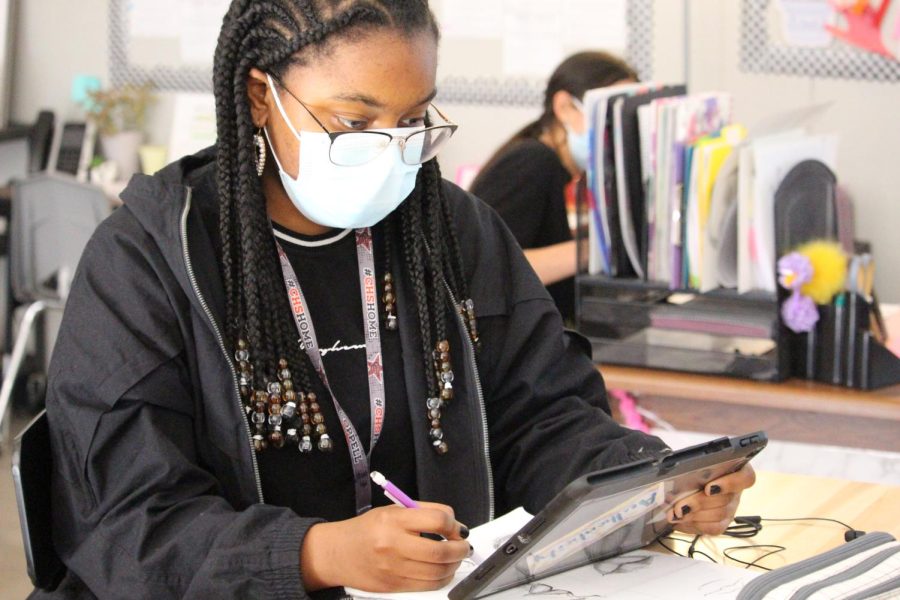 Coppell High School junior Alexis Sibanda draws mouths from reference for a portrait project. Sibanda’s artwork depicts her friends and family, often commentating on social justice issues. 