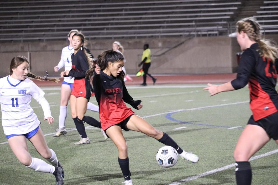 Coppell junior Saiya Patel passes against Plano West at Buddy Echols Field on Friday. Coppell lost to Plano West, 3-0. 