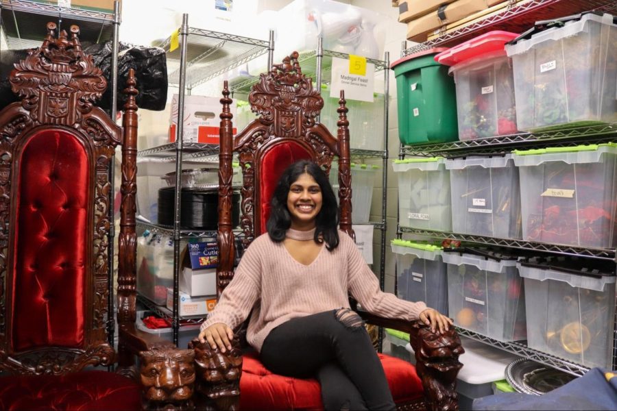 Coppell High School senior Megna Gopinath sits on the Madrigal feast prop The King’s Throne in the choir props room on Feb. 7. Gopinath has been involved in multiple choirs since sixth grade, including the Coppell Middle School East choir, treble choir and Madrigal choir.