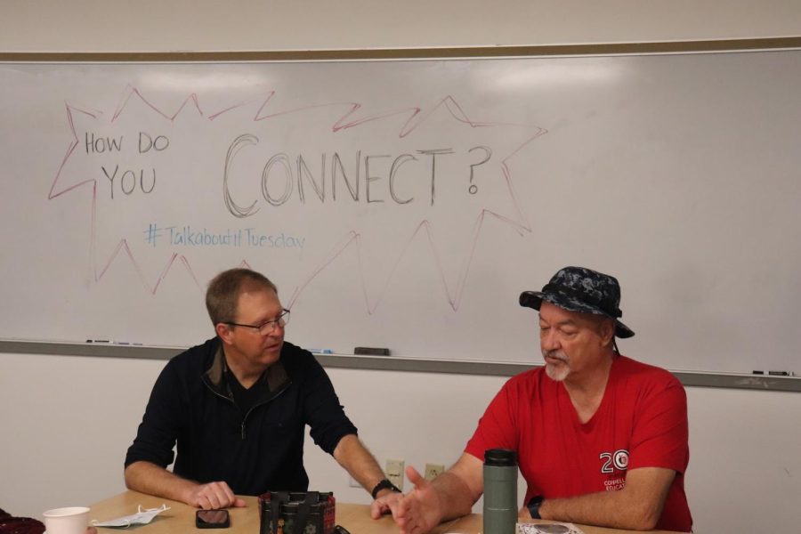 Coppell High School AP statistics teacher Lowell Johnson and STEM teacher Stan Burnett participate in Talk about it Tuesday with fellow staff members in the ROC on Feb. 1. CHS faculty and staff are engaging in optional bonding activities this semester to build relationships. 