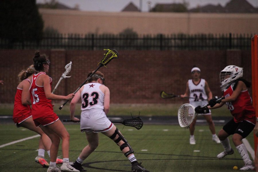 Coppell senior Finley Tipton scores against Parish on Tuesday at Coppell Middle School North. Coppell defeated Parish,19-5. Photo by Olivia Short.