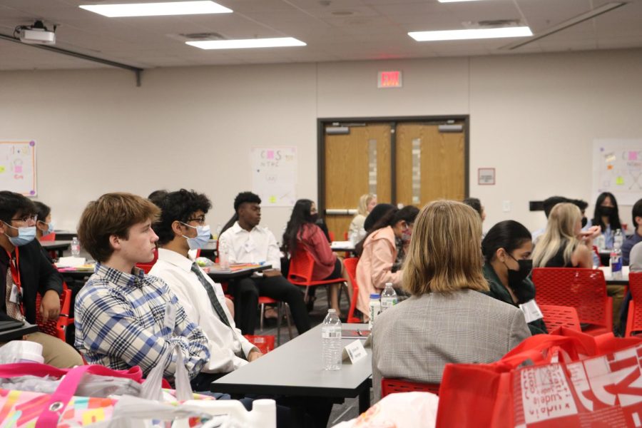 Michaels customer marketing tech Sachin Shrey discusses loyalty and engagement with members of the iLead Student program on March 10 at Coppell Middle School West. iLead Student exposes selected Coppell juniors to leadership and volunteering services.