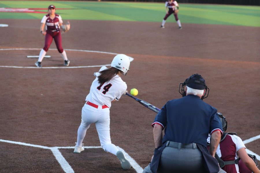 Coppell+junior+outfielder+Hannah+Gullat+scores+against+Fort+Worth+North+Side+at+the+Coppell+ISD+Baseball%2FSoftball+Complex+on+Thursday.+The+Cowgirls+beat+the+Hawks%2C+8-1.+%0A