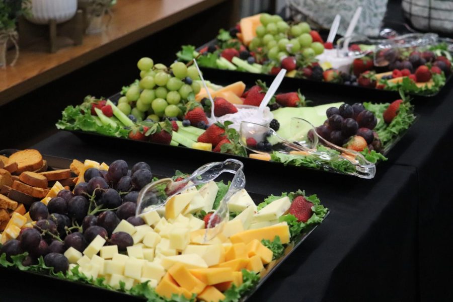 Fruit and cheeses are laid out for Teacher of the Year recipients and families at the Coppell ISD Board of Trustees meeting at the Vonita White Administration Building on Monday. The board honored district Teacher of the Year recipients and approved the usage of ESSER funds to provide additional compensation for teachers. 