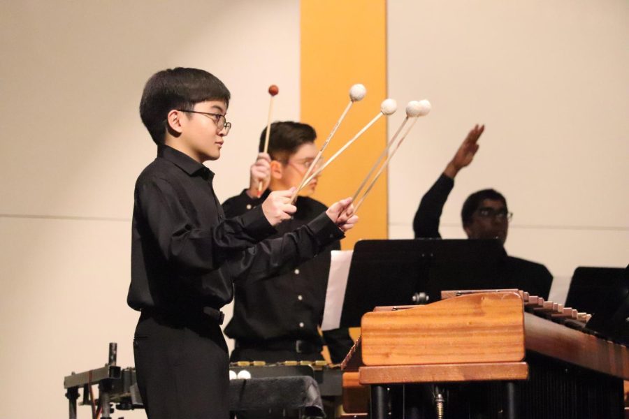Coppell High School junior Matthew Tindoc plays the marimba in the CHS Auditorium on Saturday. The CHS Drumline and Coppell middle school percussionists presented their annual “Purely Rhythmic” show, featuring guest artist Team Islas.