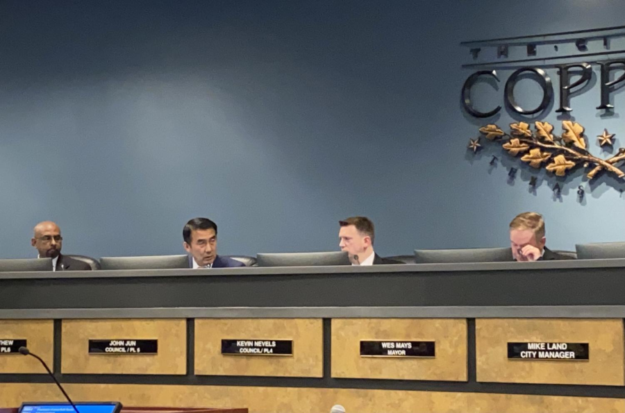 Coppell+councilmember+John+Jun+discusses+the+repeal+of+the+code+of+conduct+with+city+attorney+Robert+E.+Hager+during+the+city+council+meeting+on+Feb.+22.+During+the+meeting+on+March+10%2C+the+council+discussed+short+term+rentals+and+approvals+for+construction+projects.+