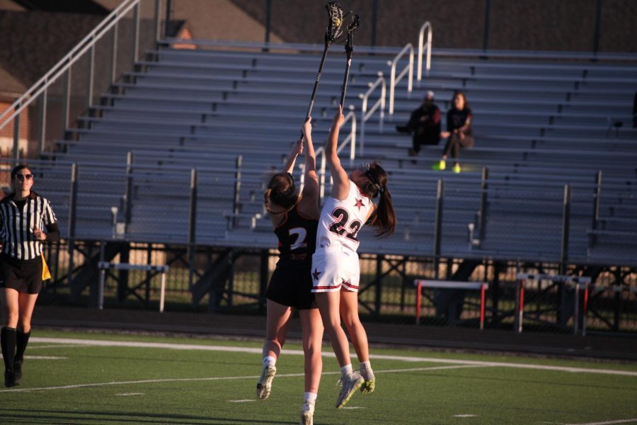 Coppell+sophomore+Ally+Gunnels+battles+against+Rockwall+on+March+31+at+Coppell+Middle+School+North.+The+Cowgirls+host+Allen+at+7+p.m.+on+Thursday+for+its+Senior+Night+game+at+CMSN.