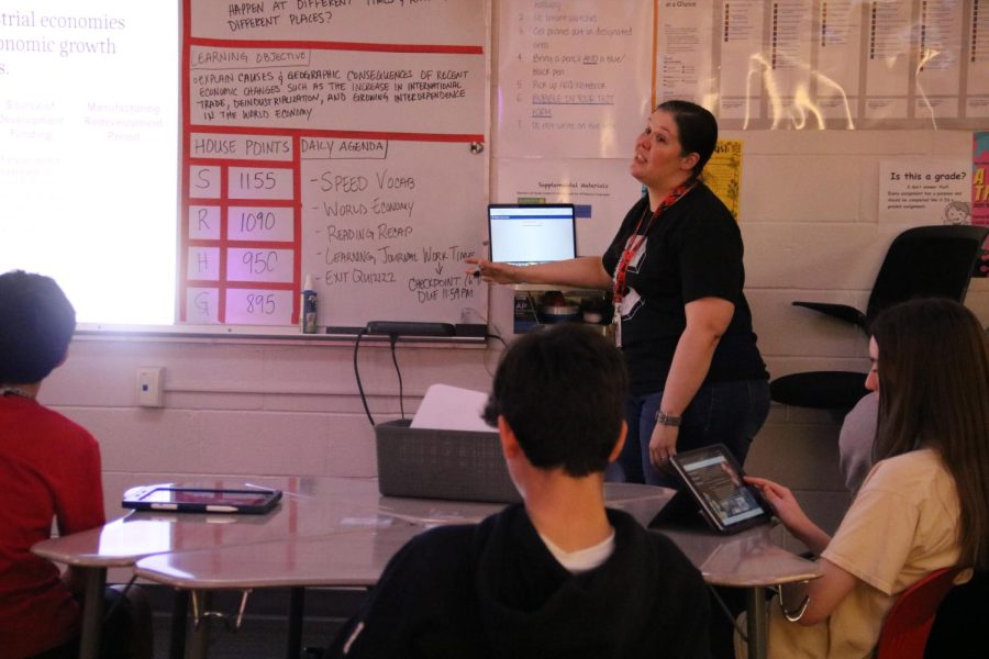 CHS9 social studies teacher Shanna Clapp elaborates on the factors that affect economic growth and development after the students in her AP human geography third period class gave short presentations on Wednesday. Clapp has been teaching at CHS9 for two years and was named February teacher spotlight.