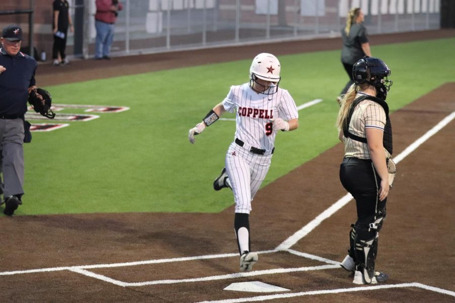 Coppell+senior+outfielder+Adrianna+Erichsen+scores+a+run+against+Plano+East+at+the+March+31+game+at+the+Coppell+ISD+Baseball%2FSoftball+Complex.+Tonight%2C+the+Cowgirls+have+their+last+district+game+of+the+season+against+Flower+Mound+at+the+Coppell+Softball+Complex.