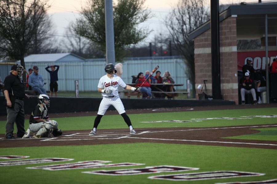 Coppell senior designated hitter Landry Fee bats against Flower Mound Marcus last night at Coppell ISD Baseball/Softball Complex. Fee hit a walk-off RBI single on a line drive to center field as the Cowboys defeated the Marauders, 3-2, in 12 innings.
