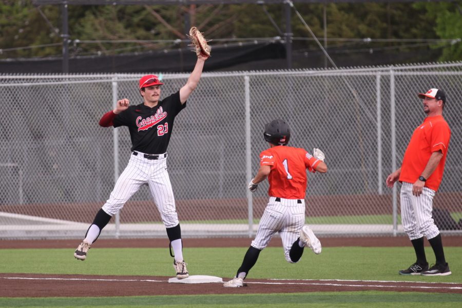 Coppell senior first baseman Walker Polk forces out Rockwall on Saturday at the Coppell ISD Baseball/Softball Complex. The Yellowjackets beat the Cowboys, 4-0.
