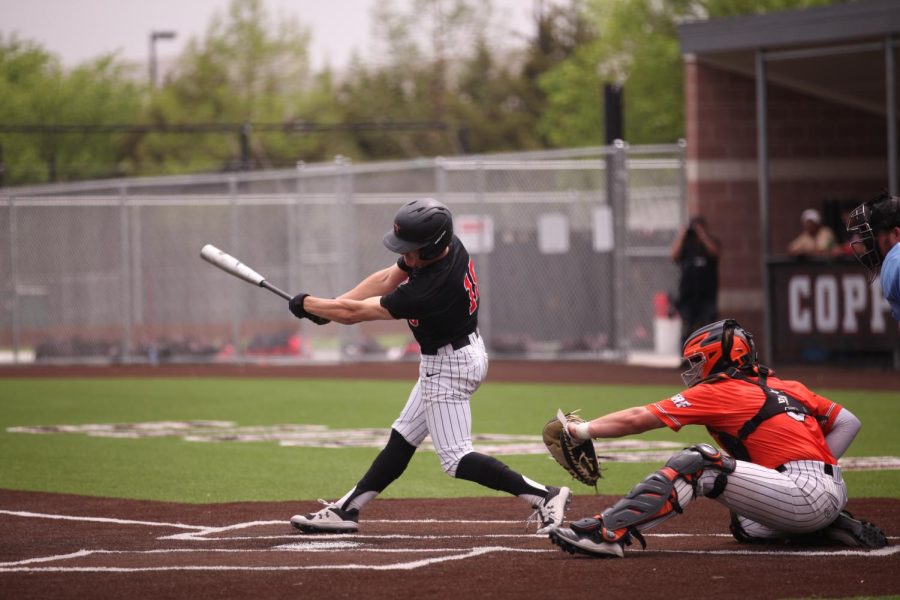 Coppell senior right fielder Charlie Barker bats against Rockwall on Saturday at the Coppell ISD Baseball/Softball Complex. The Yellowjackets beat the Cowboys, 4-0.