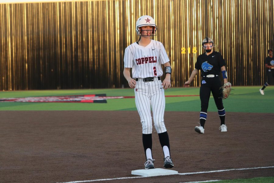 Coppell freshman infielder Natalie Howell runs back to first base at the Coppell ISD Baseball/Softball Complex on Tuesday. Howell started playing softball at age 8 and she is one of the four freshmen on the Coppell High School varsity softball team. 