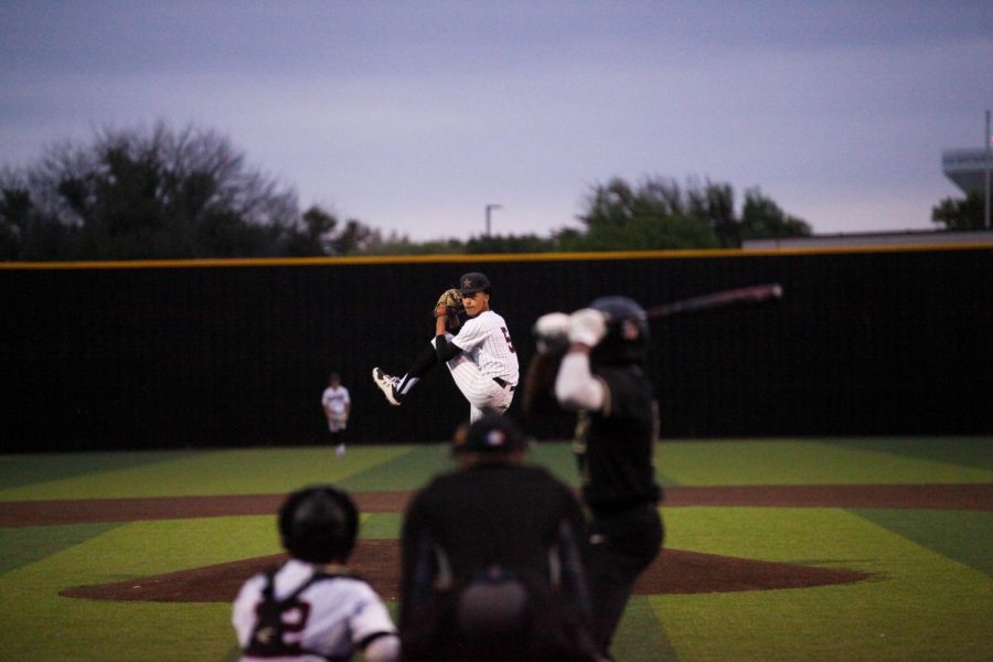 Coppell junior TJ Pompey pitches against Plano East last night at Coppell ISD Baseball/Softball Complex. The Cowboys shut out the Panthers, 3-0, behind nine strikeouts from junior pitcher TJ Pompey.