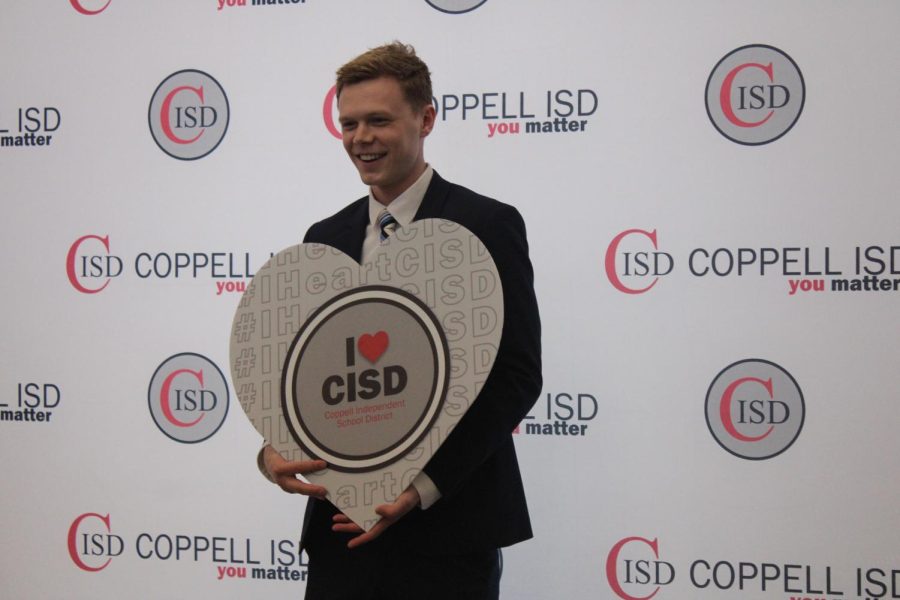 Joshua+Henderson+is+offered+a+forensics+science+teaching+position+at+Coppell+High+School+for+the+next+school+year+on+Saturday+at+Coppell+Middle+School+West.+On+Saturday%2C+Coppell+ISD+hosted+a+job+fair+at+CMSW+that+allowed+applicants+to+interview+for+various+positions.+