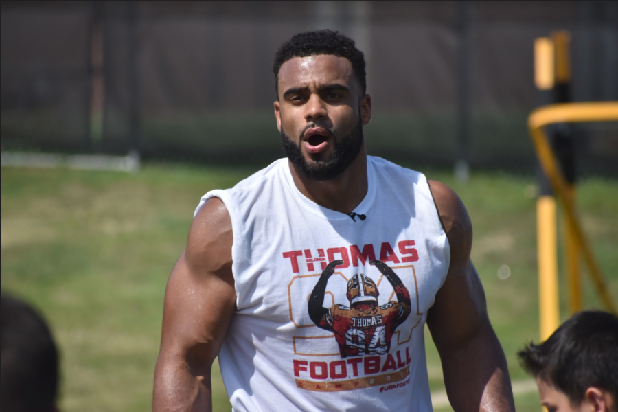 New York Jets defensive lineman and 2014 Coppell High School graduate Solomon Thomas instructs campers at the Solomon Thomas Youth Football Camp at Buddy Echols Field on June 29, 2019. Alongside his father Chris Thomas, Solomon spoke on sports, mental health and race at the Coppell Arts Center on Sunday night.