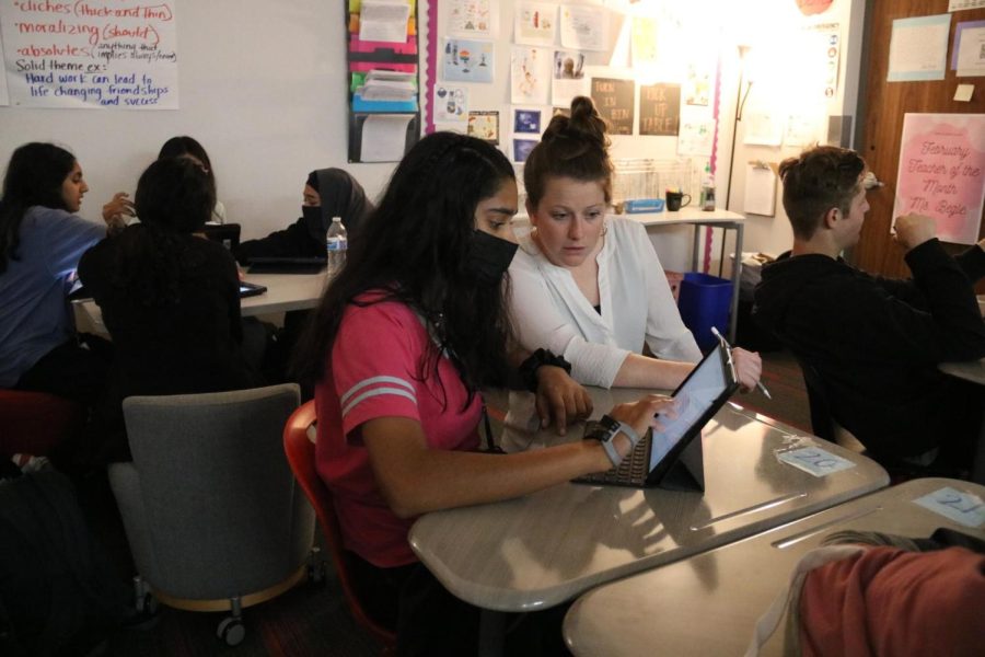 CHS9 English teacher Erin Begle assists CHS9 student Sriya Meduri with English I STAAR EOC practice questions during third period on Wednesday. Begle started teaching at CHS9 this school year and the CHS9 student council recognized her as February teacher of the month. 