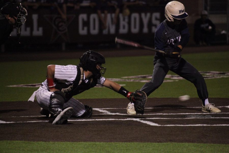 Coppell senior Bradley Castillo catches against Flower Mound at the Coppell ISD Baseball/Softball Complex on April 29. The Cowboys beat the Jaguars, 3-2, and open the Class 6A Region I bi-district playoffs tonight against McKinney Boyd. 
