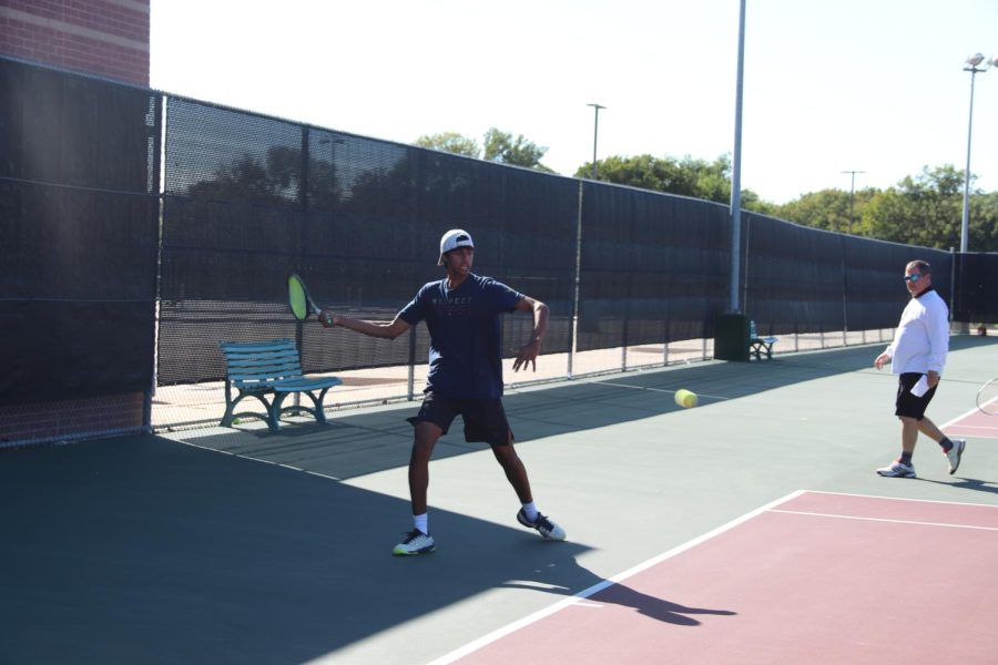 Coppell High School senior varsity tennis captain Vinay Patel hits a forehand during practice at the CHS Tennis Center on Oct. 18. Patel and fellow senior Lindsay Patton earned their way to the Class 6A State Tennis tournament on April 26 at the Northside Tennis center in San Antonio. 
