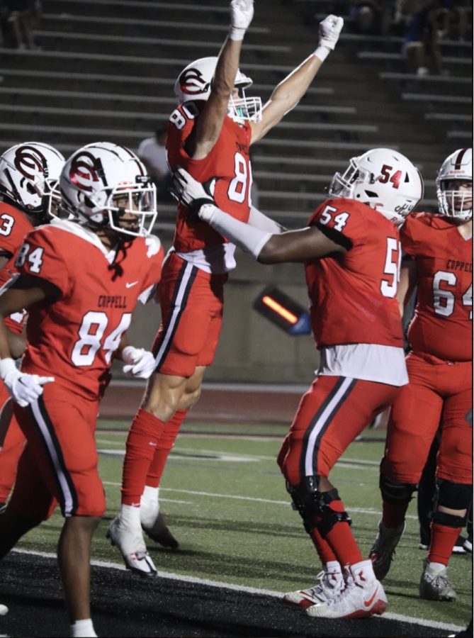 Coppell’s junior wide receiver Baron Tipton celebrates a touchdown during the second half of Coppell’s 46-35 victory over Plano West. Coppell plays Lewisville tonight at 7 p.m. at Max Goldsmith Stadium in District 6-6A action.