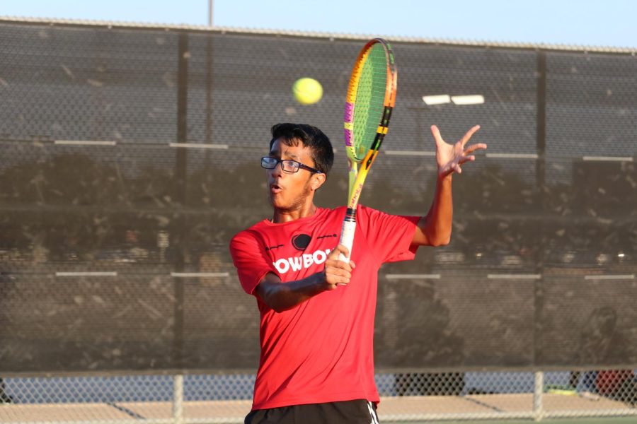Coppell senior Mayank Ajwani returns in his doubles match against Houston Clear Brook on Sept. 16 at the Coppell Tennis Center. Ajwani and his partner, senior Ekansh Agarwal, beat Clear Brook, 7-5, 6-0. Coppell beat Clear Brook, 16-3. 