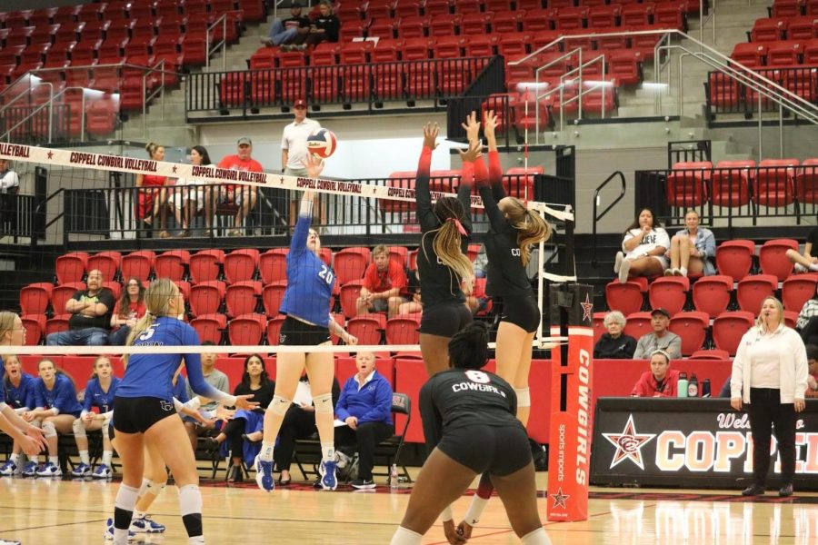 Coppell+senior+middle+blocker+Ekwe+Anwah+and+junior+right+side+hitter+Mira+Klemblock+Hebron+outside+hitter+Addison+Vary+at+Coppell+High+School+Arena+on+Sept.+23.+The+Cowgirls+host+Plano+on+Friday.