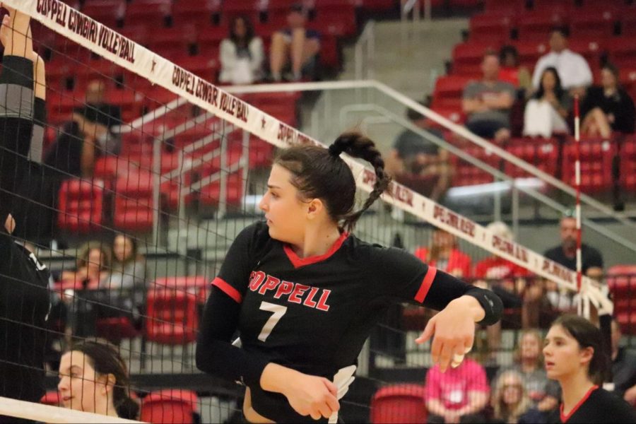 Coppell senior outside hitter Skye Lamendola hits against Denton Guyer on Aug. 31 at the Coppell High School Arena. Lamendola plays varsity volleyball while balancing schoolwork, enriching her leadership skills in the past four years. 