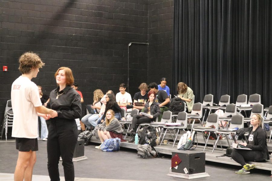 Coppell+High+School+senior+understudy+Jude+Taylor+and+CHS9+understudy+Piper+Baranowski+rehearse+their+lines+for+%E2%80%9CEurydice%E2%80%9D+on+Oct.+11+in+the+Black+Box+Theatre.+Eurydice+is+the+2022+fall+play+directed+by+CHS+theater+directors+Grace+Hellyer+and+Lisa+Stucker.+Photo+by+Sannidhi+Arimanda%0A