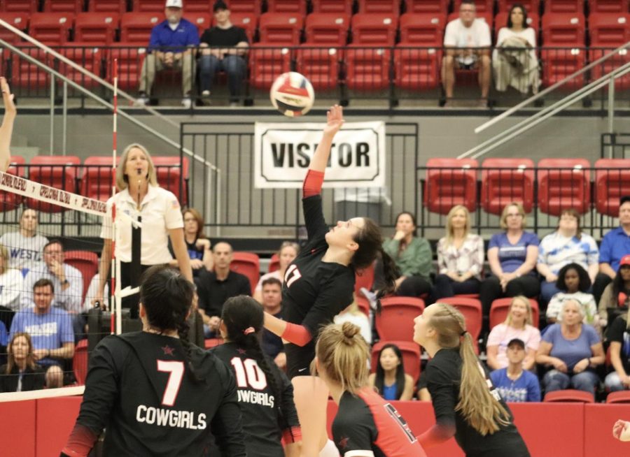 Coppell+senior+setter+Taylor+Young+spikes+against+Plano+West+in+Coppell+High+School+Arena+on+Tuesday.+Plano+West+defeated+Coppell%2C+25-15%2C+17-25%2C+28-26%2C+13-25%2C+7-15%2C+7-15.