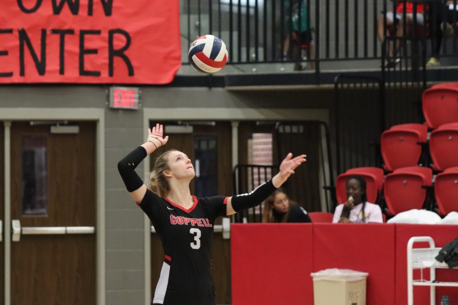Coppell junior defensive specialist Kate MacDonald serves against Plano at CHS Arena on Friday. Coppell hosts Plano West at 6:30 p.m. today at CHS Arena.