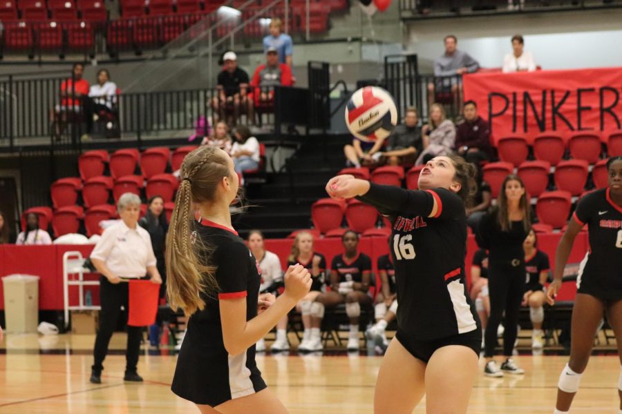 Coppell senior defensive specialist Addison Hesse passes against Plano at CHS Arena on Friday. The Cowgirls defeated Plano, 25-9, 25-22, 25-12. 