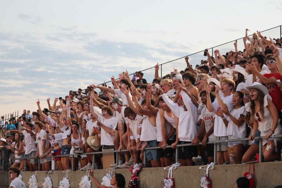 The Coppell High School student section cheers on the Cowboys as they face the Wolves at Buddy Echols Field on Sept. 23. Coppell defeated Plano West, 46-35, on homecoming.