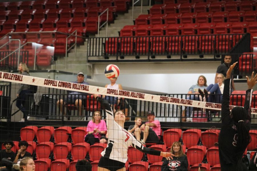 Coppell senior outside hitter Skye LaMendola hits against Lewisville in CHS Arena on Friday. The Cowgirls defeated Lewisville, 25-10, 25-8, 25-18.
