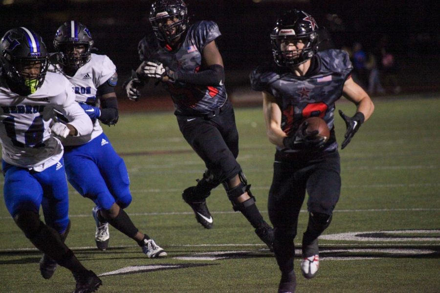 Coppell senior wide receiver Zack Darkoch runs against Hebron at Buddy Echols Field on Friday. Coppell defeated  Hebron, 43-35. 