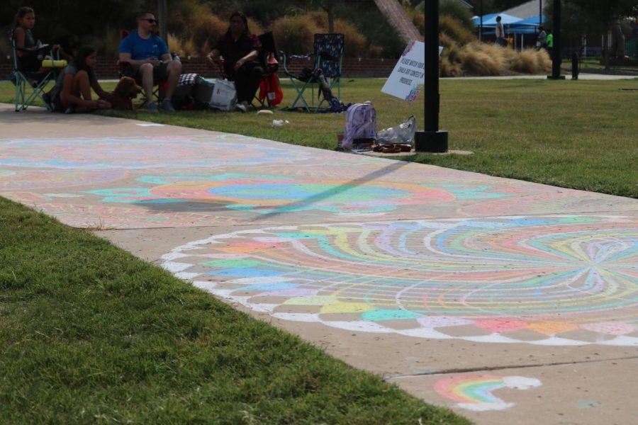 Artwork for the annual chalk art contest line the sidewalks of Andrew Brown Park East on Oct. 8. Coppell’s annual Kaleidoscope festival highlights the diversity of the community through displays of art, culture and music.