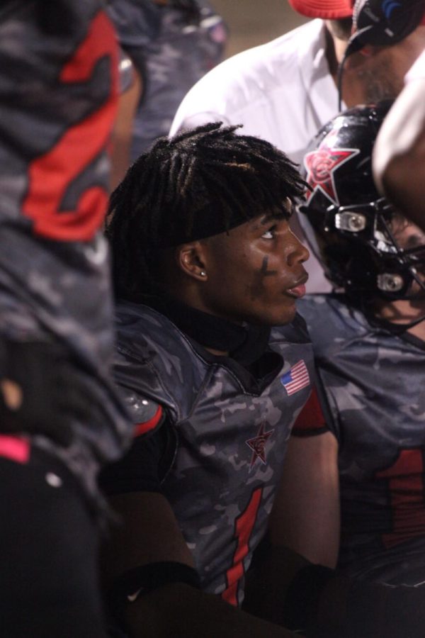 Coppell senior linebacker Ike Odimegwu recharges on the bench after a stop by the defense. Coppell lost to McKinney 44-26 on November 11th at Buddy Echols Field.