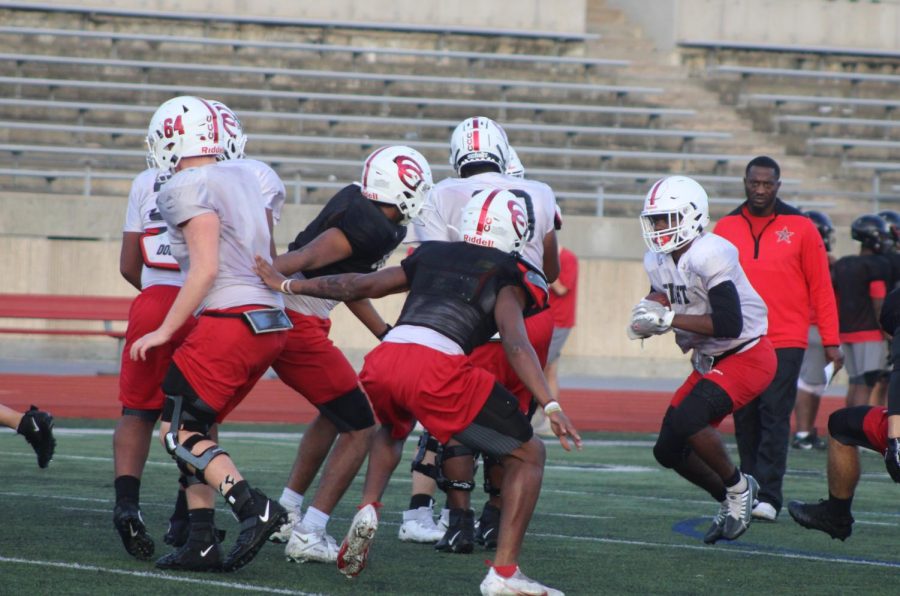 Coppell head coach Antonio Wiley oversees practice on Monday at Buddy Echols Field. The Coppell football team is preparing for its final regular season game on Friday at 7 p.m. at Buddy Echols Field against Plano. 