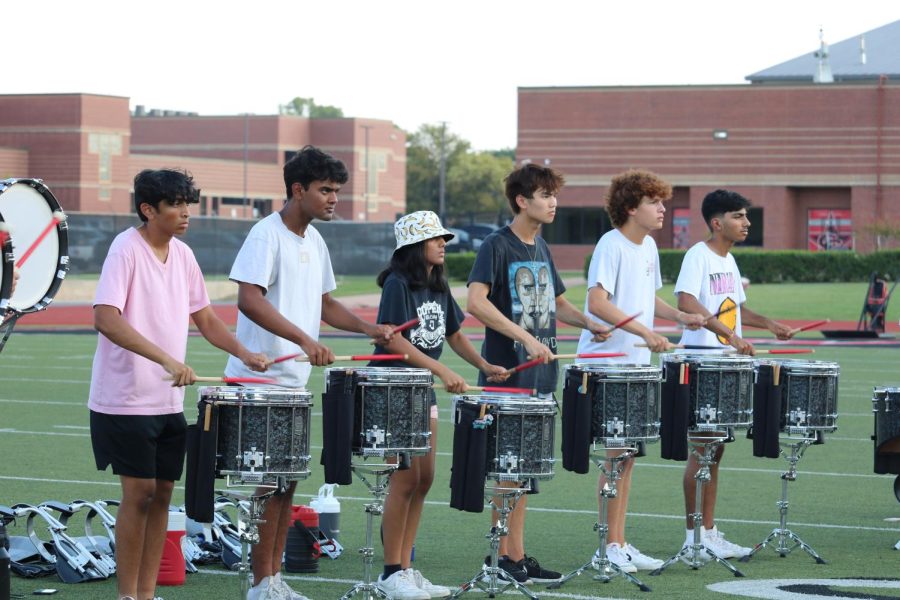 Coppell High School front ensemble practices at Buddy Echols Field on Sept. 16 before their competition at Dripping Springs High School. Coppell Percussion was named winner of the Advanced Large division of the 2022 Thunder in the Hills Percussion Contest.