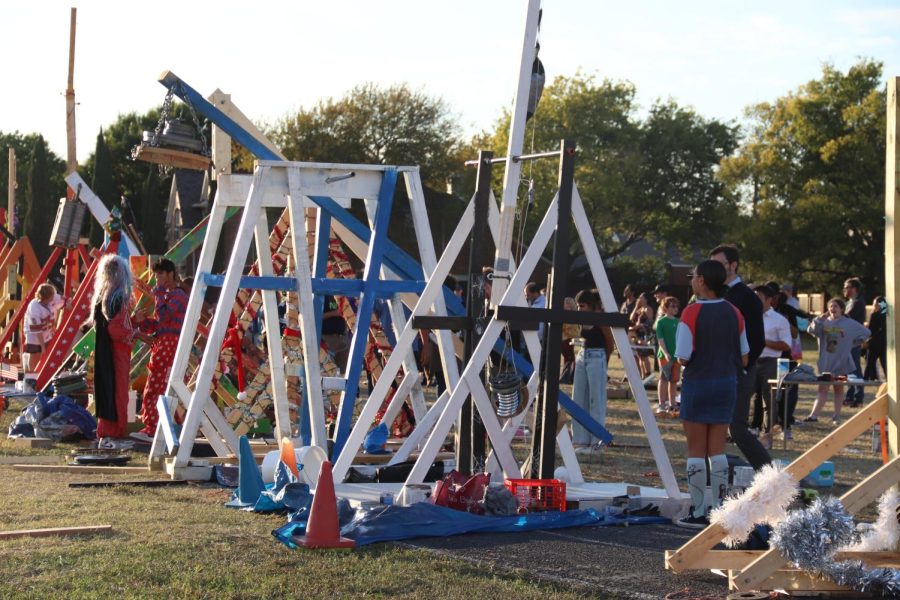 New Tech High @ Coppell physics students demonstrate the abilities of their trebuchets during the Punkin’ Chunkin’ event at the NTH@C Fall Festival on Thursday. The annual Fall Festival is held to celebrate Halloween and raise funds for a selected charity; this years pick is SafeHaven. 