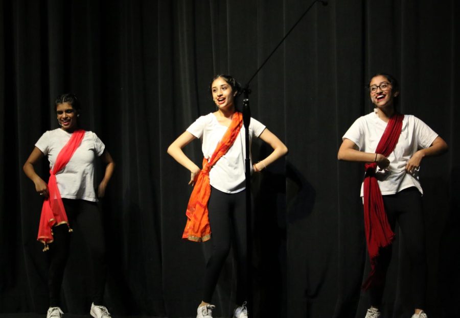 Coppell High School Respira senior Mihira Kada, junior Megha George and junior Samiksha Routhu perform “Baraso Re” by Shreya Goshal at the Respira Show. Respira’s annual fall dessert show, featuring the theme “Whatever It Takes,” was Saturday evening at the Coppell High School Auditorium.