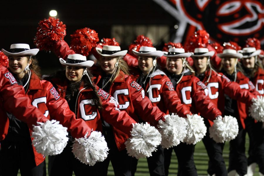 The Lariettes cheer on the Coppell football team before the game against McKinney at Buddy Echols Field on Nov. 11. McKinney defeated Coppell, 44-26, in the Class 6A Division II Region I bi-district playoffs on Friday at Buddy Echols Field. Photo by Aliya Zakir.