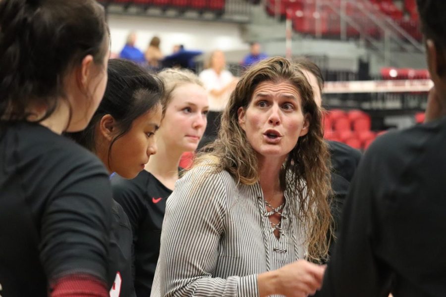 Coppell+volleyball+coach+Robyn+Ross+leads+a+team+huddle+at+CHS+Arena+against+Plano+West+on+Oct.+14.+Ross+was+named+Cowgirls+volleyball+coach+this+year+after+coaching+for+Nansemond-Suffolk+Academy+in+Virginia+for+13+years.+